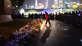 People pray for Shanghai stampede dead
