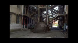 Domineering flower building two buildings sharing a staircase