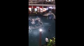 Naked man swimming in public, at Marina Bay Sands (MBS) Singapore, 31dec 2014