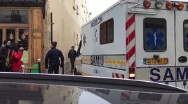 Ambulance leaves scene of Paris attack on Charlie Hebdo