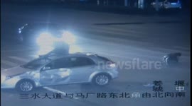 Scooter rider thrown across car roof in China