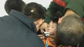 Boy's tongue freed from can in China