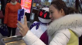 Robot waitress serves customers in China