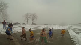 People run into freezing water in Canada