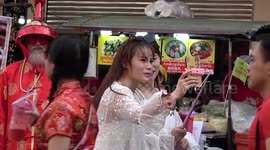 Tourists and locals enjoy Chinese New Year celebrations in Bangkok