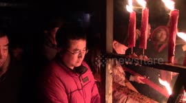 Thousands of citizens queue to burn incense in temple for new year wishes
