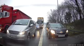 UK driver tries to use shoulder to cut traffic, other cars band together to teach him a lesson