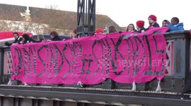 Activists unfurl massive banner on London's Lambeth Bridge in support of Stansted15