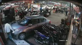 Terrifying moment, Mirclously escape of three persons as car ramps on them in India.
