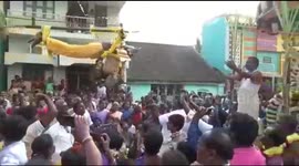 Bizarre ritual sees devout Hindus hanging from 25-foot tall pole by their skin