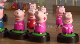 Folk artists make Peppa Pig toys out of dough for the Year of the Pig