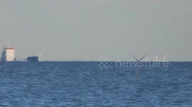 Man debunks flat earth theory with wind farm footage
