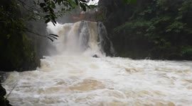 Heavy rain from Storm Erik turns Lake District rivers into raging torrents at Rydal Hall, Ambleside, UK