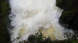 Heavy rain from Storm Erik turns Lake District rivers into raging torrents at Rydal Hall, Ambleside, UK