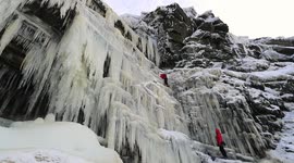 Ice climbers scale stunning frozen waterfall in England's Peak District