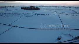 Minninglow. Snow covers the ancient burial ground, in the Derbyshire Peak District