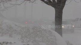 Blizzard conditions in heavy snow and severe wind in Orillia Ontario Canada as cold winter weather returns