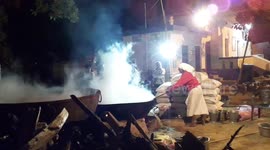 Cooked in such a big container that you have never seen before   The scene of a rural religious festival of Hinduism