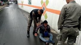 Beggar pretending to be disabled were arrested by local government officers