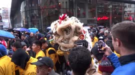 Chinese New Year 2019 celebrations in London - Dragon Dance in the rain in Soho