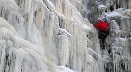 Ice climbers scale stunning frozen waterfall in England's Peak District
