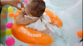 Baby relaxes at spa like a boss