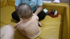 Cute baby loves being pampered