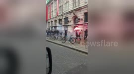 PSG Ultras march through Manchester city centre with flares