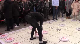 International students challenge giant Chinese chess in eastern China