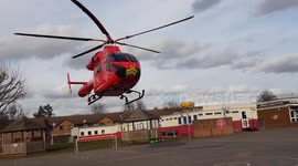Air ambulance takes off from school playground in East London after a double stabbing