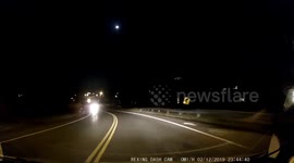 bright shooting star on dashcam
