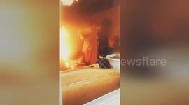 Heroic fireman risks life to drag burning gas cylinder out of house