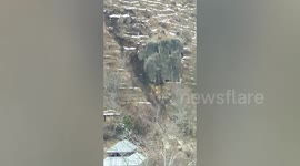 Scary moment mountainside collapses during massive landslide in India's Jammu