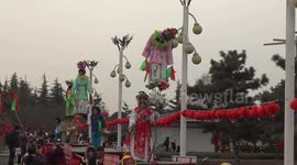 Six-year-old performer nods off while suspended in midair on a pole