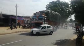 Truck drags car for three kilometres along Indian road after hitting it head on