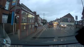Cyclist with can of drink drops his bike and chases cam car,