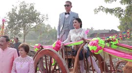 Couples get married in cow-drawn wooden carts to mark Valentine's Day