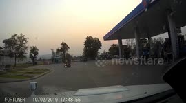 Motorcycle catches fire while filling up at gas station