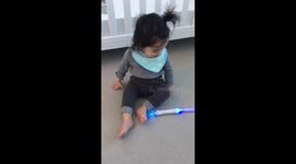 Baby celebrating grandma birthday over video