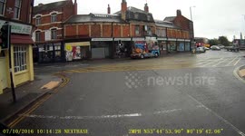 Parked car moves off and cuts up HGV