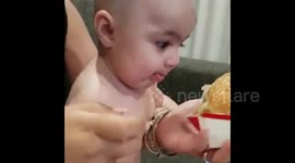 Hungry Aussie baby craves a Big Mac during midnight feed