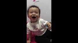 Genius laughed very happily