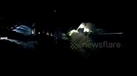 Herd of elephants refuses to leave calf that fell into a ditch in India