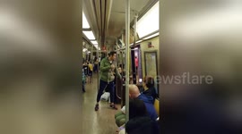 Newsflare Edit - Boyfriend grapples with teenagers in NY subway after they step on girlfriend's foot