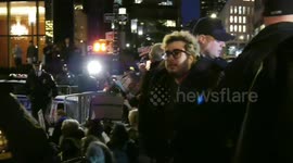 Dozens of arrests as protesters gather outside NYC Trump hotel over emergency declaration