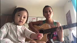One year old baby cute reaction while Mama sings ‘just the way you are’ to her