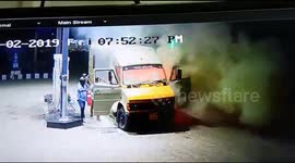 Incredibly brave men push truck on fire away from petrol station