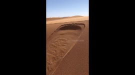 Sand dunes in Saharan desert create miniature avalanche