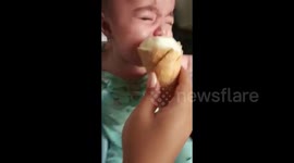 Hungry Aussie baby instantly calms down when eating ice-cream