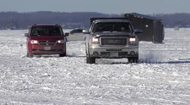 Cold sunny winter day fun on frozen lake north of Toronto at Keswick Ontario Canada